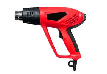 Hot Air Gun - A compact hot air gun used for stripping paint and shrinking wrap.